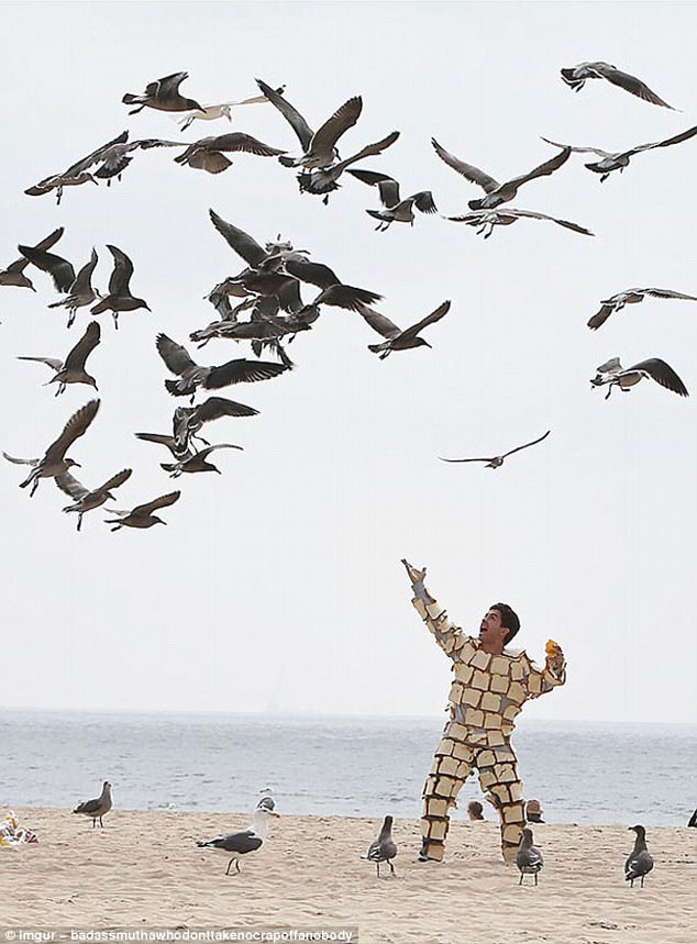 3F631F7300000578 4425880 Serenading seagulls This man has seemingly plastered himself wit a 3 1492671960566