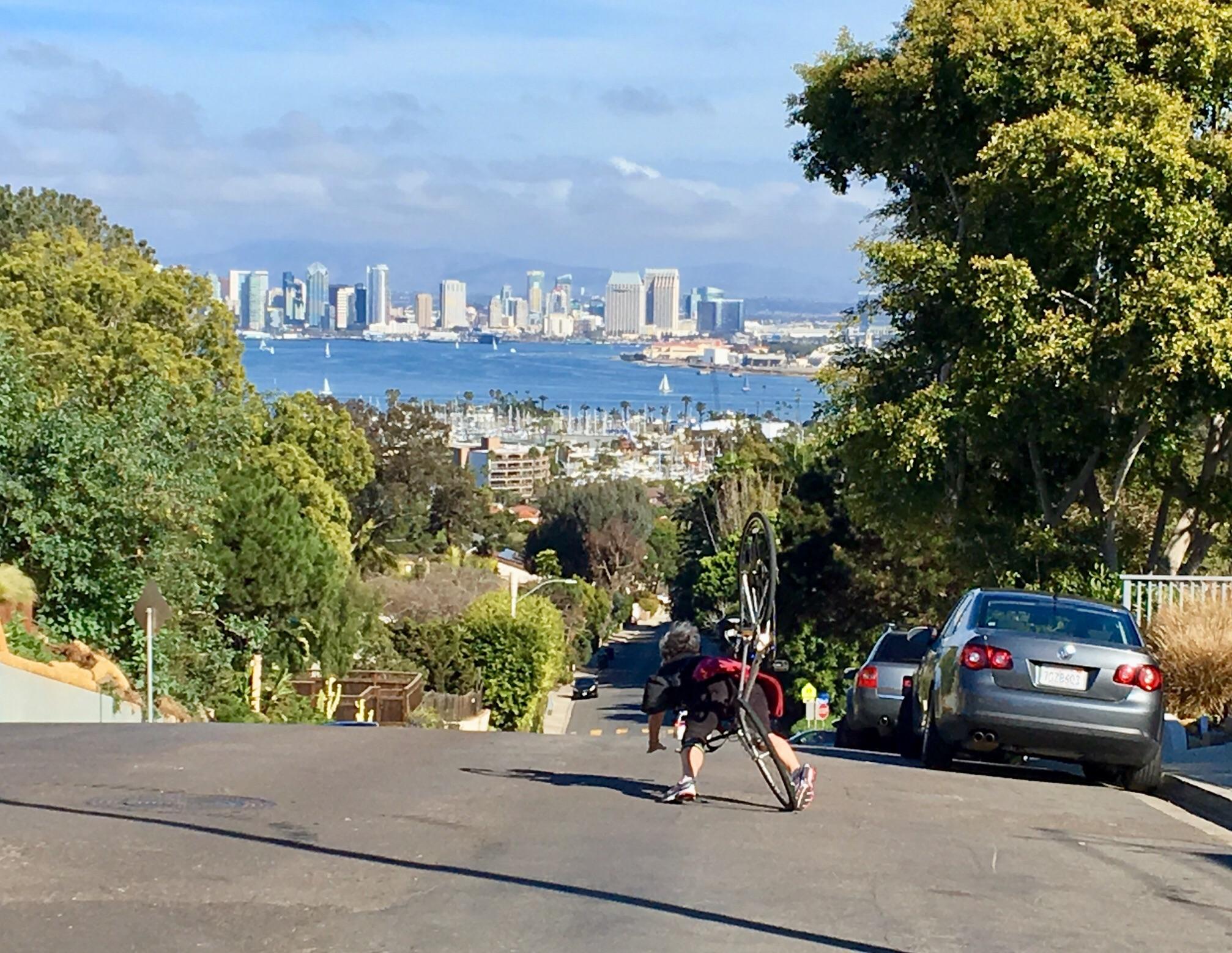 Friend taking pic of me with San Diego in background right when I go ass over teakettle. No worries just bruised— worth it